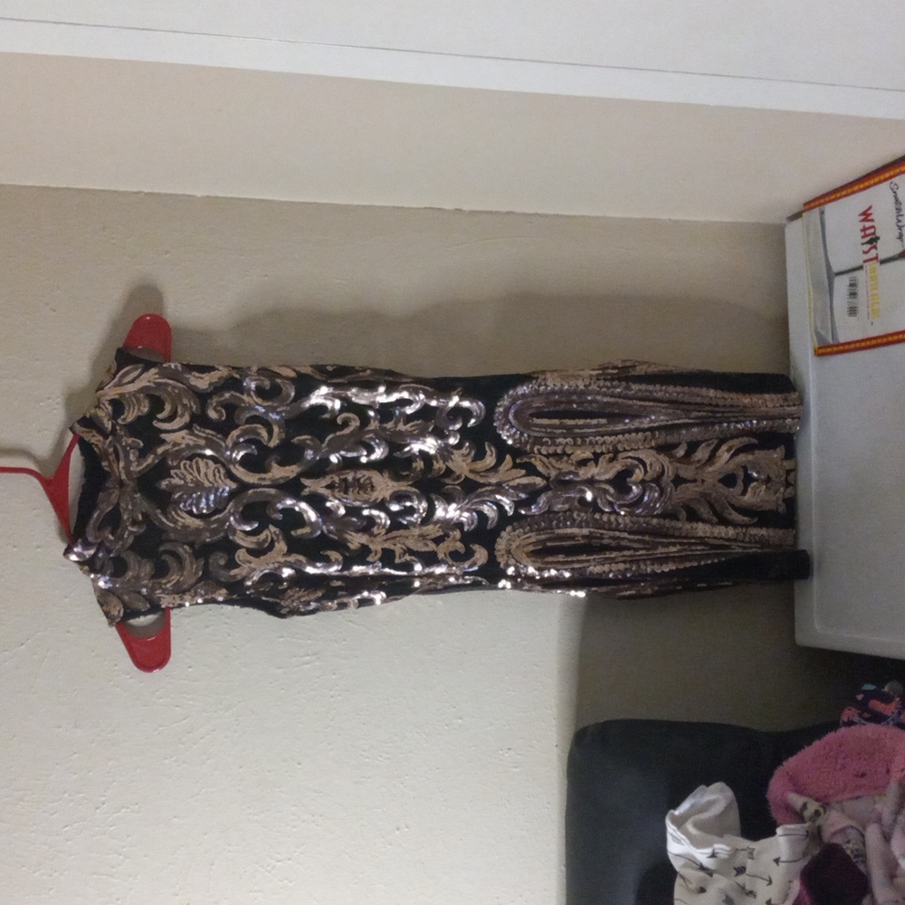 Black and gold sequins dress
